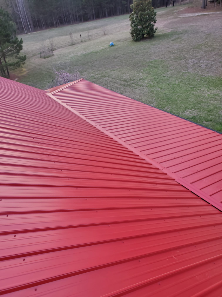 A standing-seam metal roof in red color